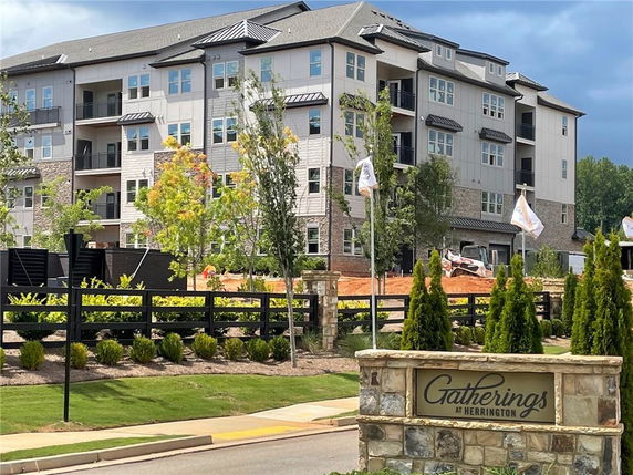 Front view of a multi-story apartment building.