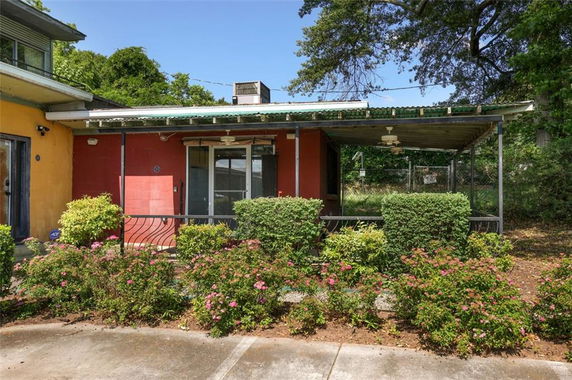 Front view of a single-story house with a covered porch.