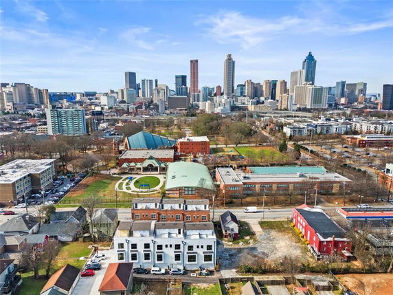 Panoramic view of a cityscape with various buildings and skyscrapers.