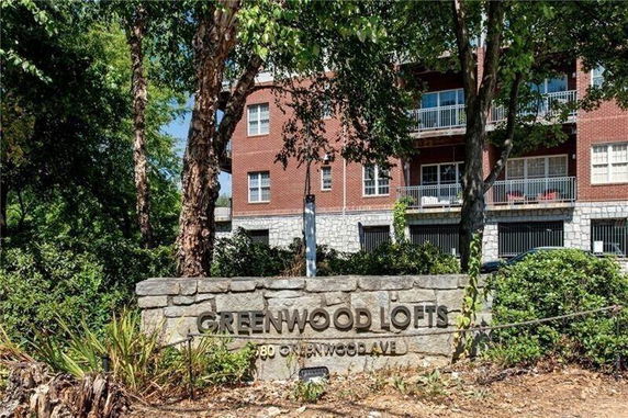 Front view of an apartment building named Greenwood Lofts.