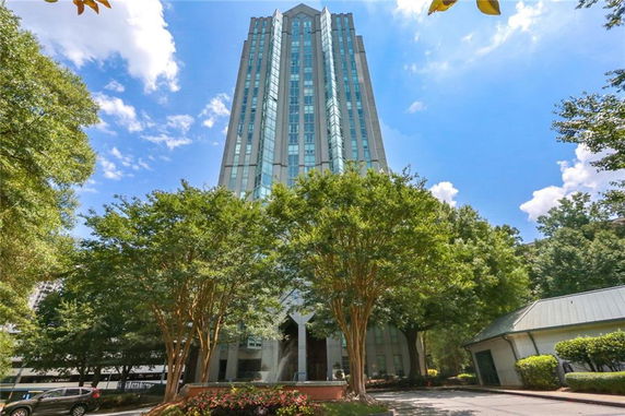 Front view of a tall multi-story building.