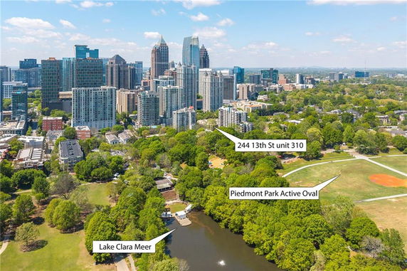 Panoramic view of a cityscape and surrounding park areas.
