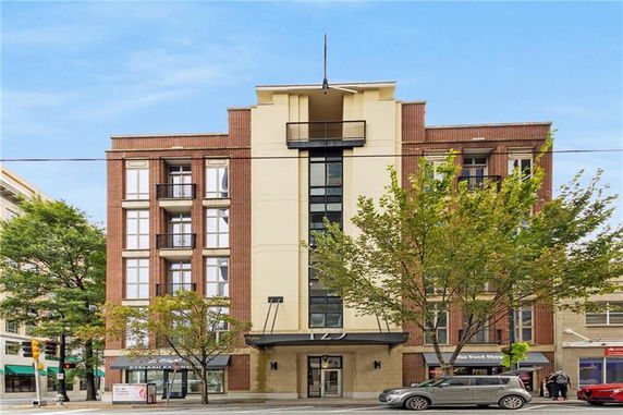 Front view of a multi-story building with a modern design.