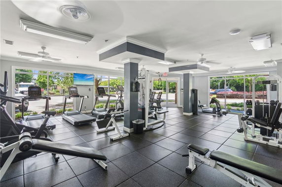 Interior view of a gym with exercise equipment.