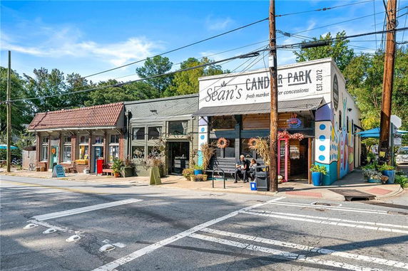 Front view of a building with a store named Sean's Candler Park.