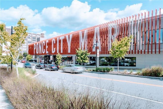Front view of a building with large signage reading 'Ponce City Market.'