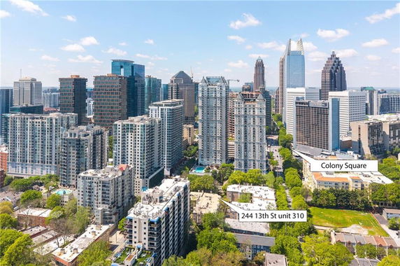 Panoramic view of a cityscape with numerous high-rise buildings and a labeled location.