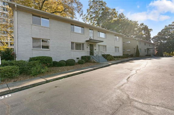 Front view of a two-story apartment building.