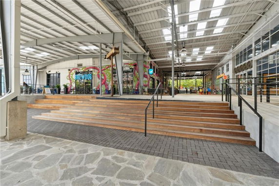Interior of a recreational facility with a bar and seating area.