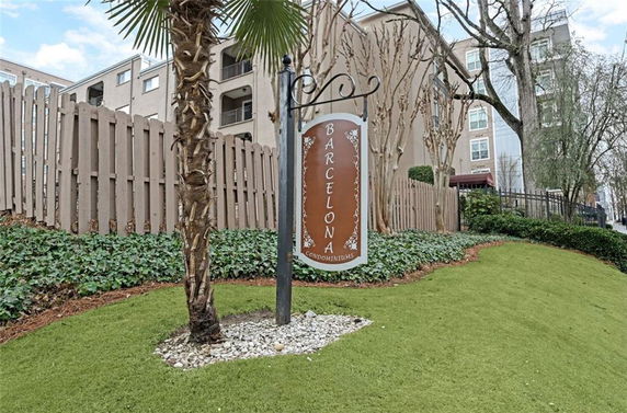 Front view of a multi-story condominium building.