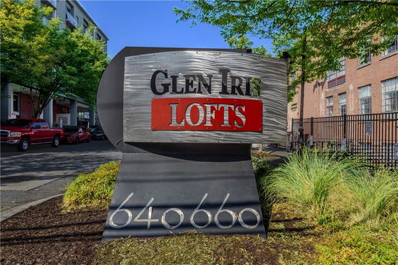 Front view of a building with sign for Glen Iris Lofts.