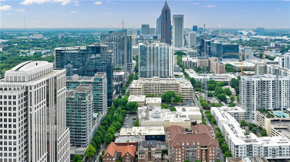 Panoramic view of a cityscape with multiple high-rise buildings and skyscrapers.