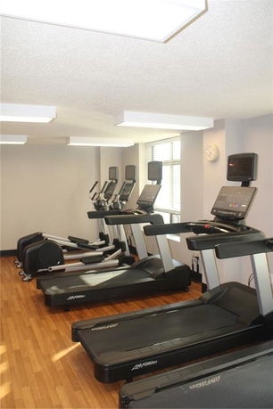 Indoor gym area with treadmills
