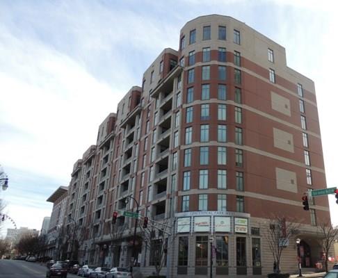 Front view of a multi-story building with a modern architectural design.