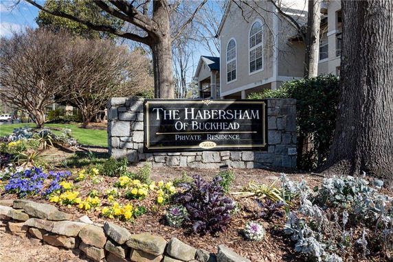 Front view of a residential building with stone signage reading 'The Habersham of Buckhead.'