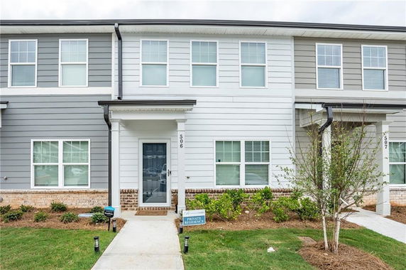 Front view of a two-story townhouse.