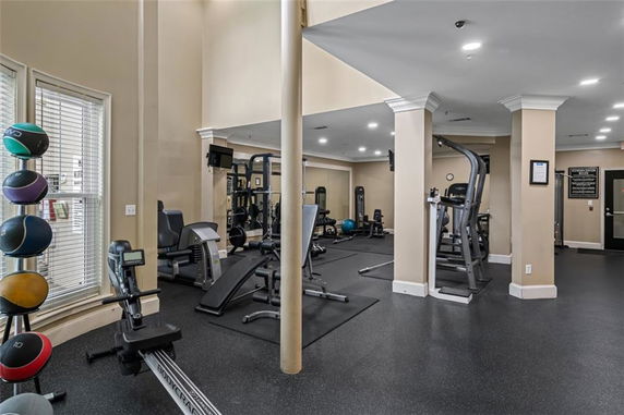 Interior view of a gym with exercise equipment and fitness machines.