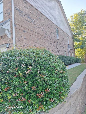 Side view of a two-story brick house.