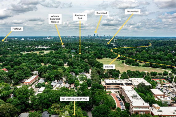 Wide-angle view of a cityscape with labeled areas including parks and buildings.