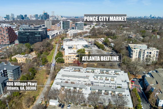 Wide aerial view of buildings in Atlanta with labels for notable locations like Ponce City Market and Atlanta Beltline.