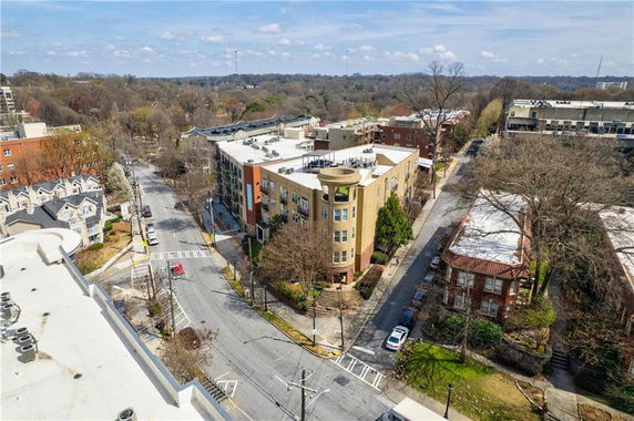 Aerial view of a multi-story building in an urban neighborhood.