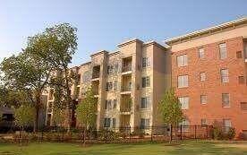 Front view of a multi-story apartment building.