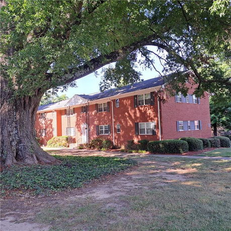 Front view of a two-story brick building.