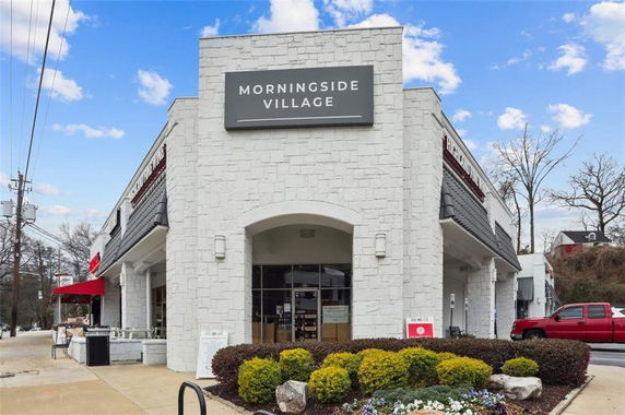 Front view of a commercial building with signage reading 'Morningside Village'.