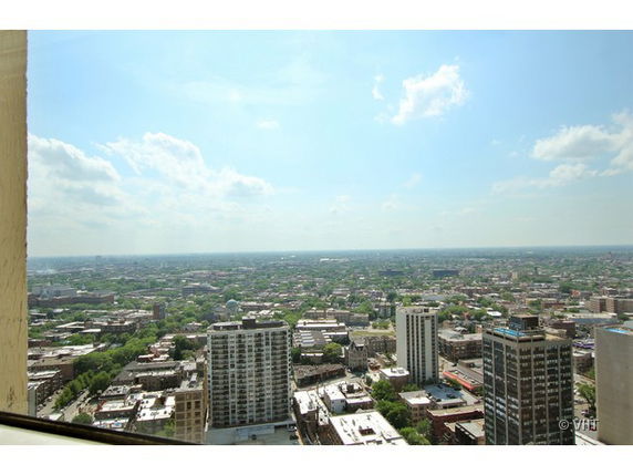 Panoramic view of cityscape from a high vantage point.
