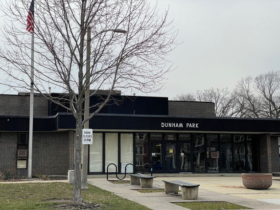 Front view of a single-story public building labeled Dunham Park.