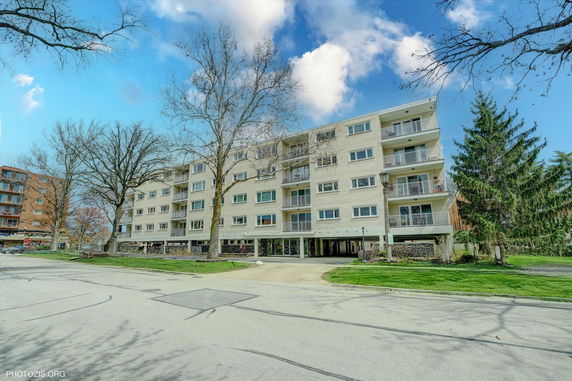 Front view of a multi-story apartment building.