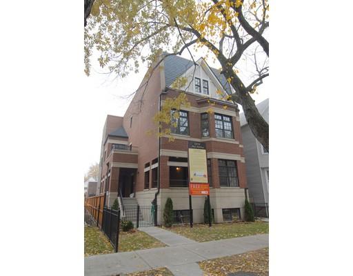 Front view of a multi-story brick house.