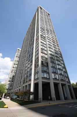 Front view of a tall multi-story building.