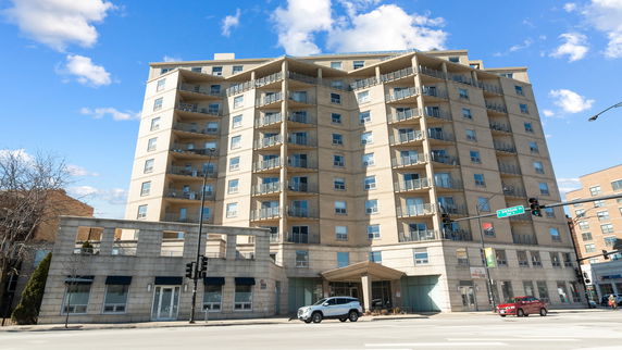 Front view of a multi-story apartment building.