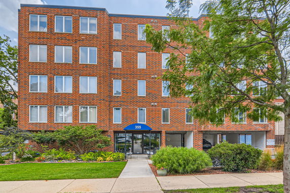 Front view of a multi-story brick building.