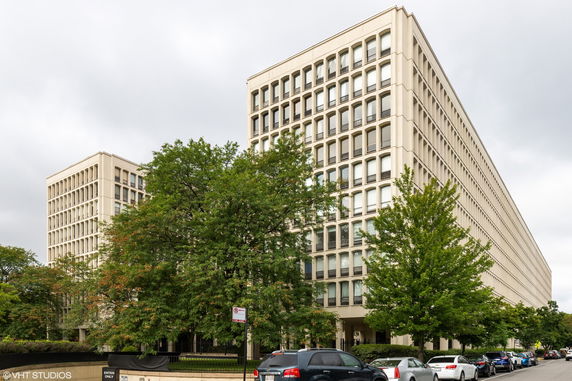 Front view of a large multi-story office building.