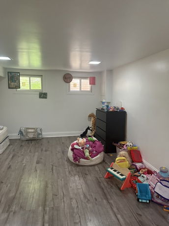 Room with children's toys and a small keyboard.