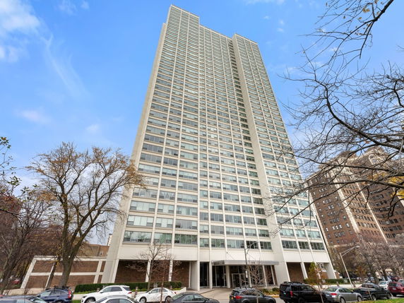 Front view of a high-rise residential building.