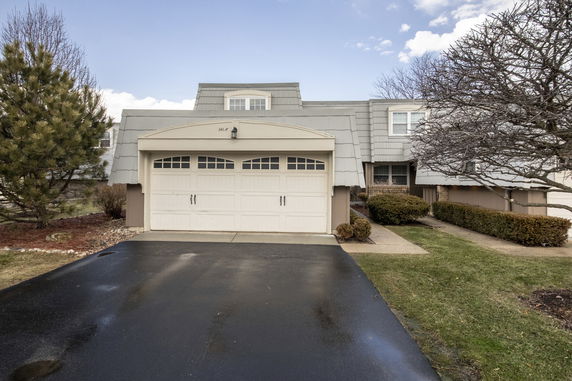 Front view of a house with a single garage.