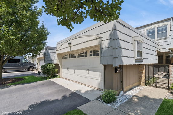 Front view of a house with a two-car garage.