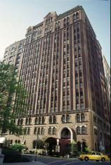 Front view of a tall multi-story building.