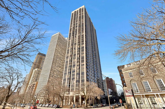 View of tall residential skyscrapers in an urban area.
