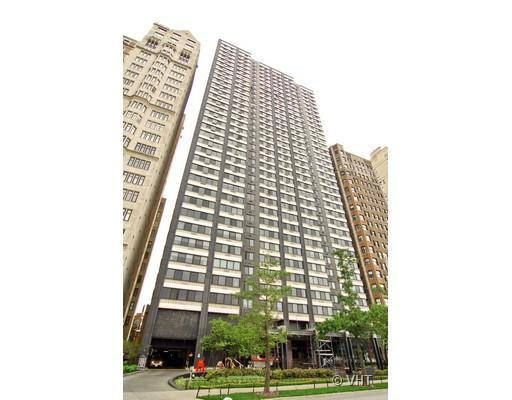 Front view of a high-rise building with numerous windows.