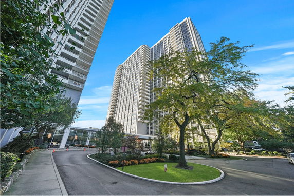 Front view of a tall residential building complex.