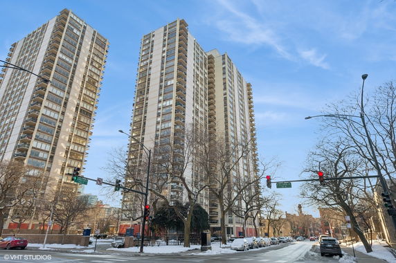 Front view of a high-rise building with multiple stories.