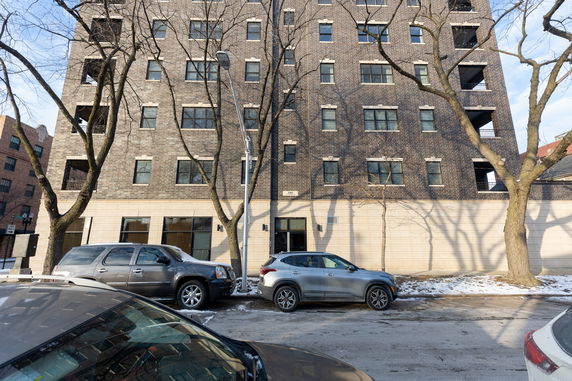 Front view of a multi-story brick building
