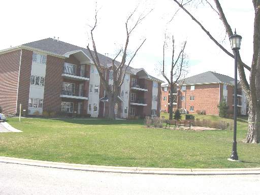 Front view of a multi-story apartment building.