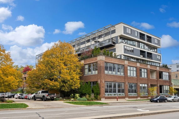 Front view of a multi-story building with a modern design.