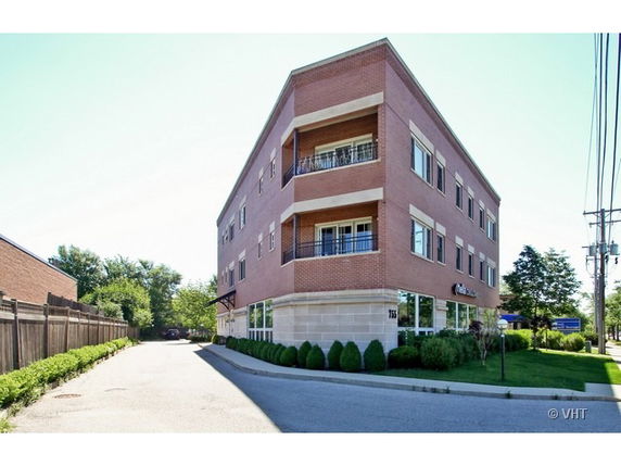 Front view of a three-story brick building.