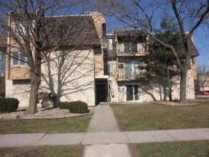 Front view of a multi-story residential building.